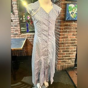 Blue paisley floor-length pearl-snap dress.
